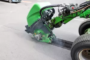 a432621 asphalt grinder with a37386 water spraying 